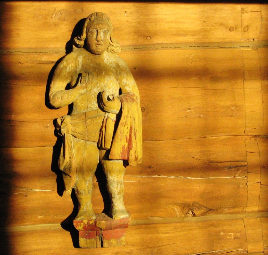 Old Statue in Oppdal church, washing each others feet